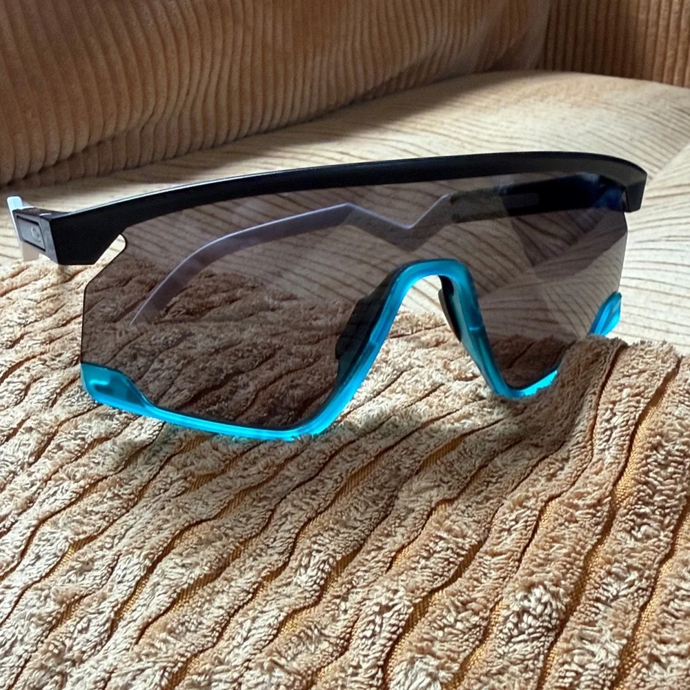 Oakley Sport Wrap Sunglasses with Teal Accent and Black Lens